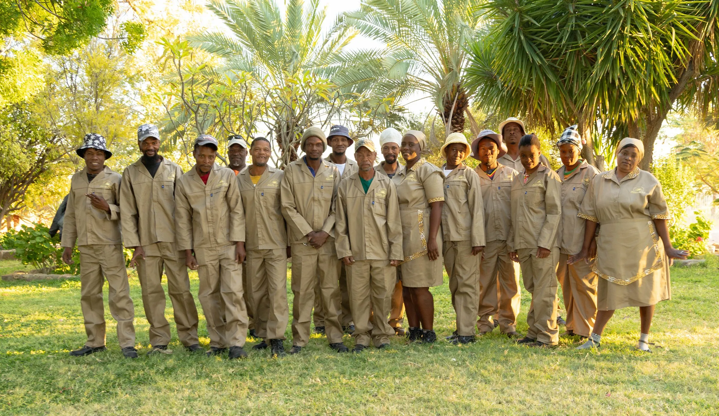 The Yaguma Lodge and Farm team together in the garden